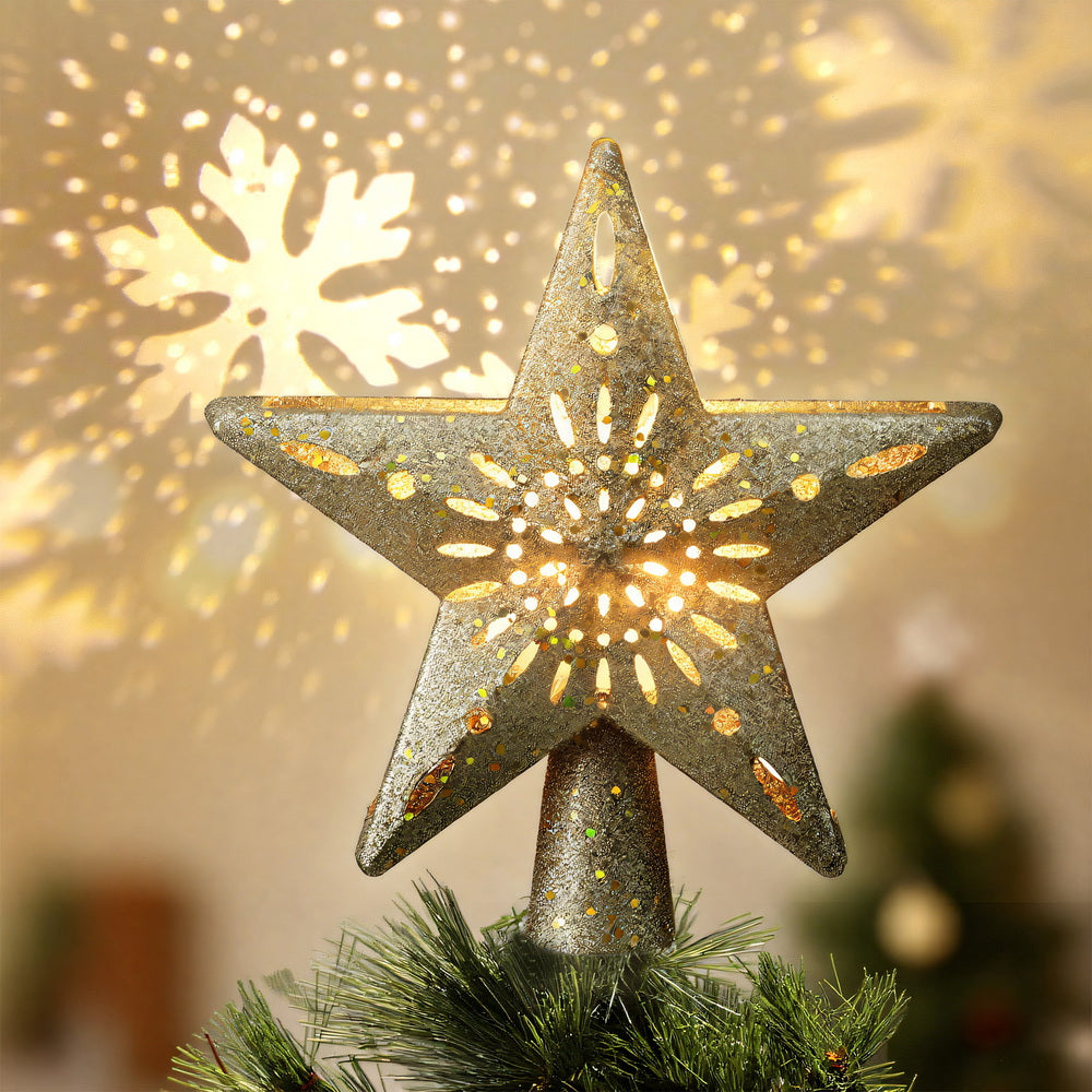 Translation missing: en.Gold illuminated Christmas tree star topper with warm white LED lights on a decorated tree: Tree Toppers